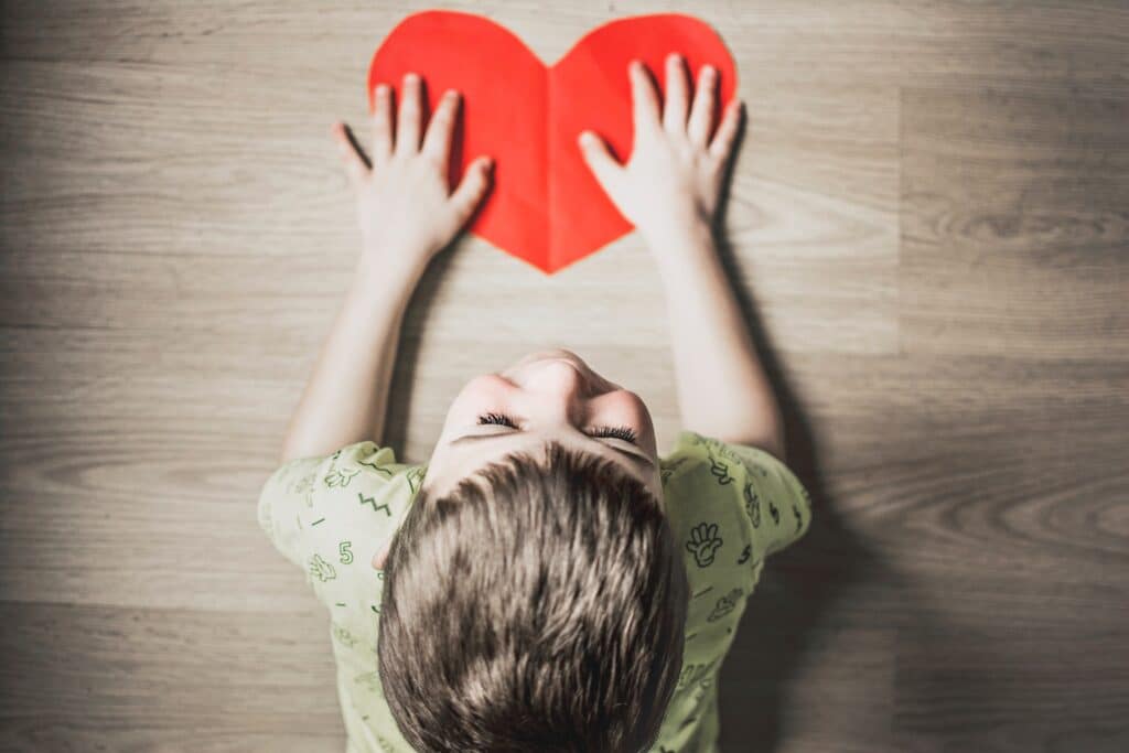 Young Child Creating A Heart